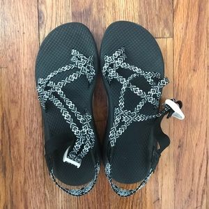 Black and white double strap Chacos